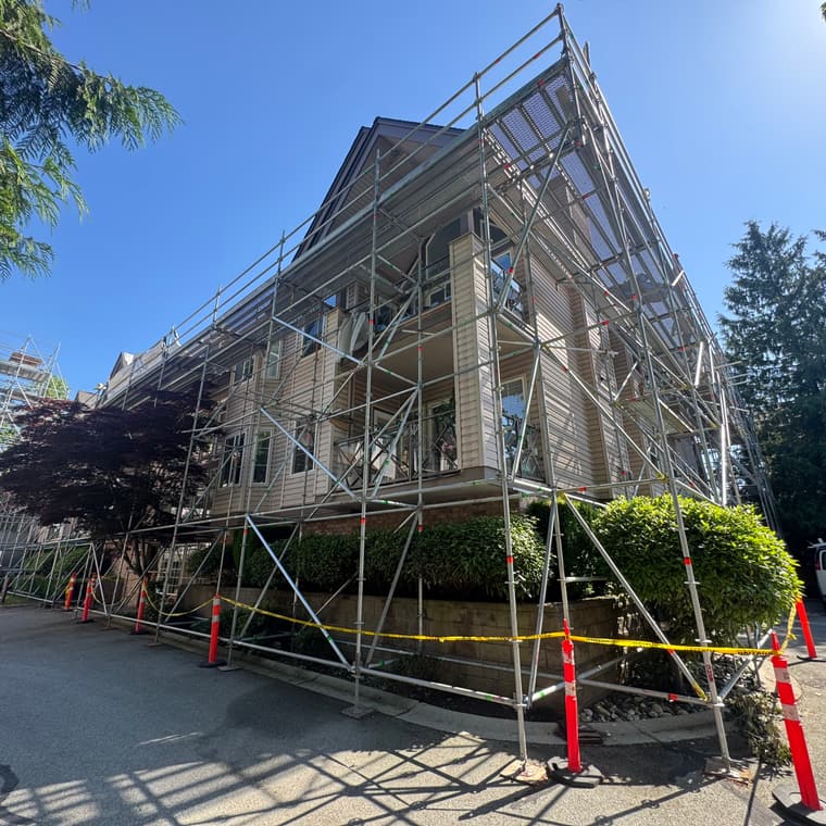 Strata building exterior painting with scaffolding